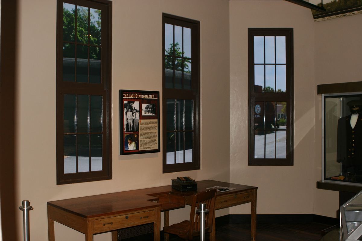 The Station Master's office on opening night, with his uniform in the case on the right.