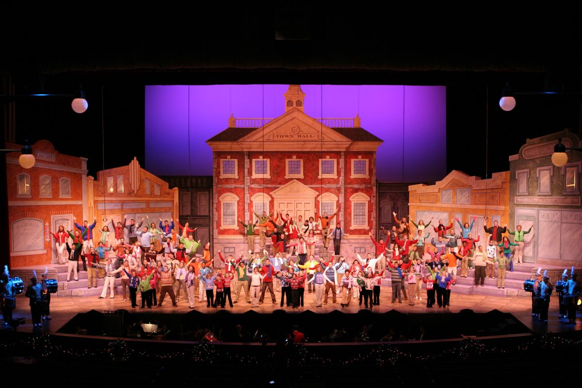 A town built across the full width of the stage.